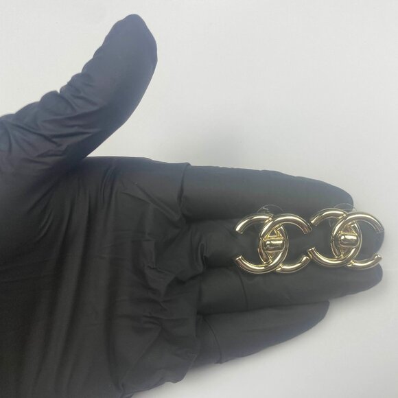 CHANEL Pre-Owned 1995 Gold Tone Turn Rock CC Clip On Earrings - Picture 3 of 9